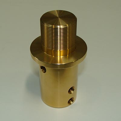 pieza metálica cilíndrica dorada